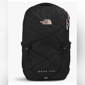 The North Face Black Jester Luxe Laptop Backpack with Coral Metallic Lettering